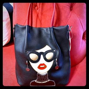 Faux leather handbag with embellishments